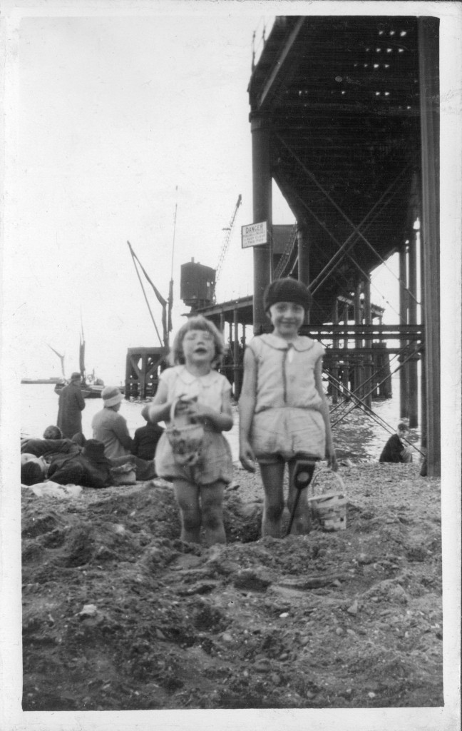 '2 girls on beach' - this seems to certainly be in the Thames Estuary in early C20 (post WWI) but who are the girls?