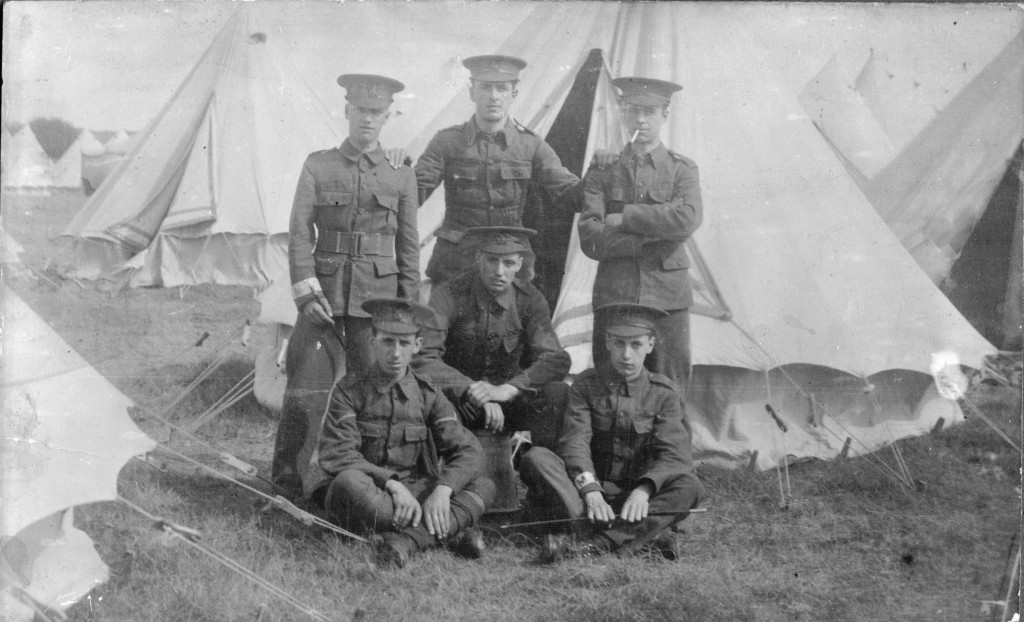 Military Police Detail? - A bit of a stretch perhaps, the arm-bands aren't that clear, but enlisted men with swagger sticks is suggestive as well. Top left may well be Arthur before he got his stripe(s)?